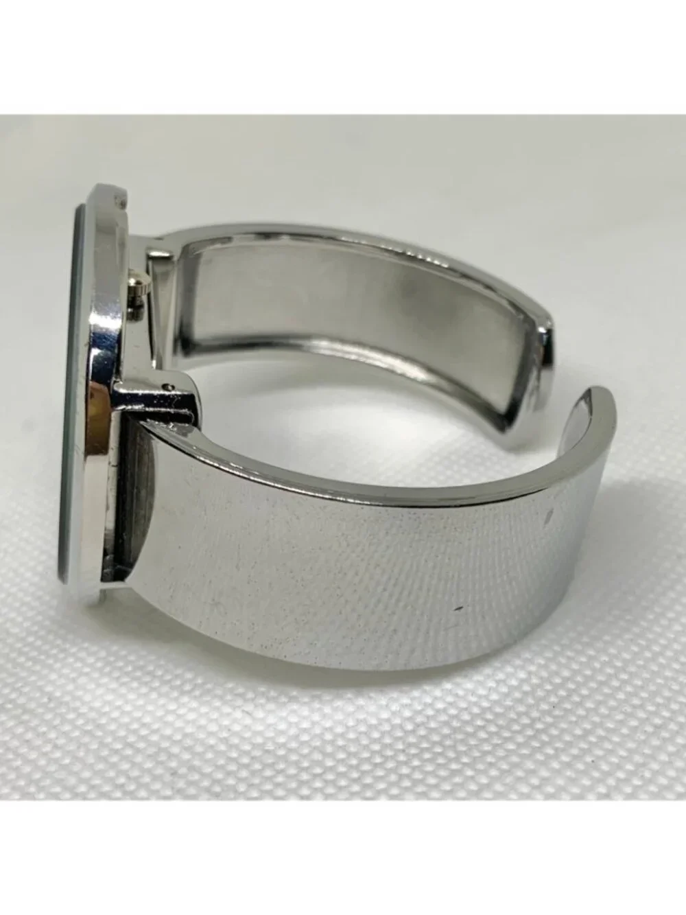 Cansnow silver black tone cuff bracelet women’s watch 42mm  quartz 6.5” running